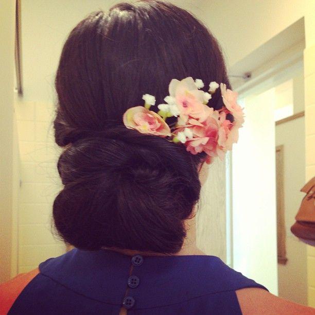 Twisted low bun w floral accents