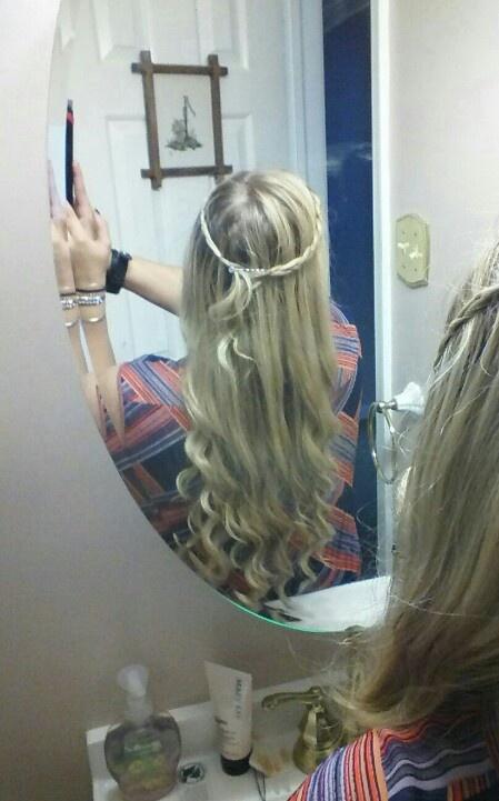 Wrap your hair around the wand for ten seconds and its curly! Then braid back your bangs!