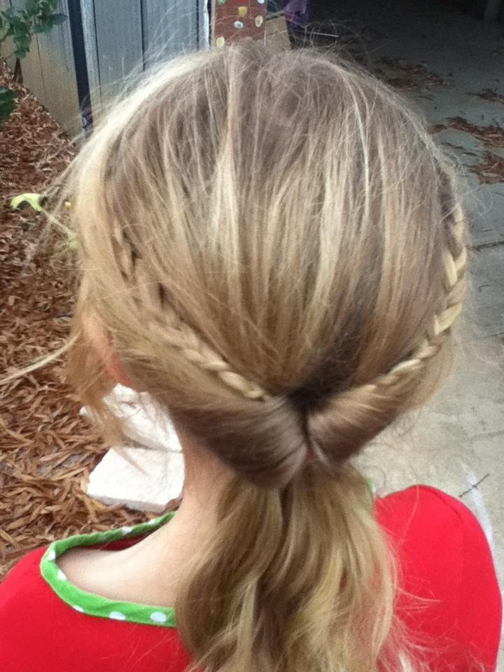 Inside out ponytail with two small braids