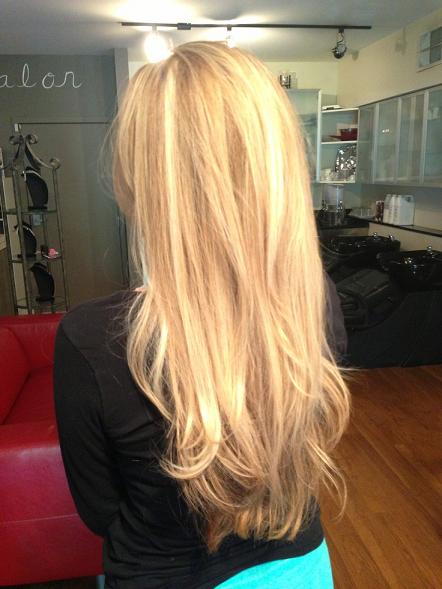 Gorgeous Natural looking multi toned Blonde Highlights with a long layered cut