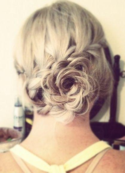 Integrate modern braids and romance for your wedding updo.