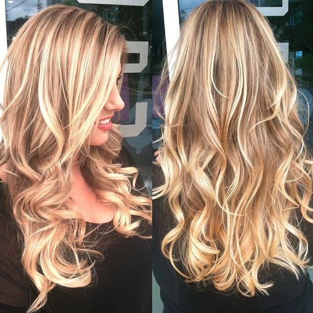 Beachy blonde highlights on top, color melt everything else from light brown to blonde, long layers & loose waves