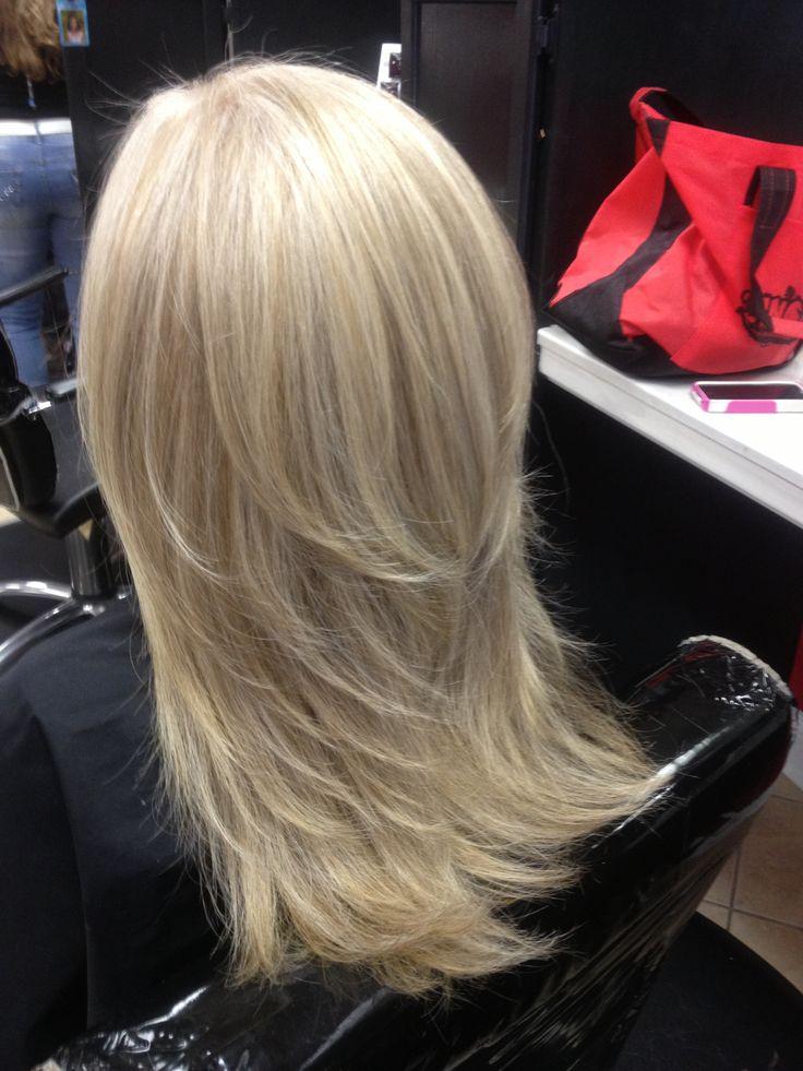 Blonde layered hair by Kalee