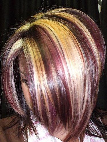 Chunky blonde streaks with burgundy.