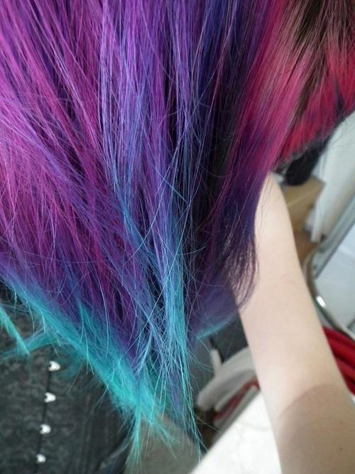 Purple turquoise pink hair.