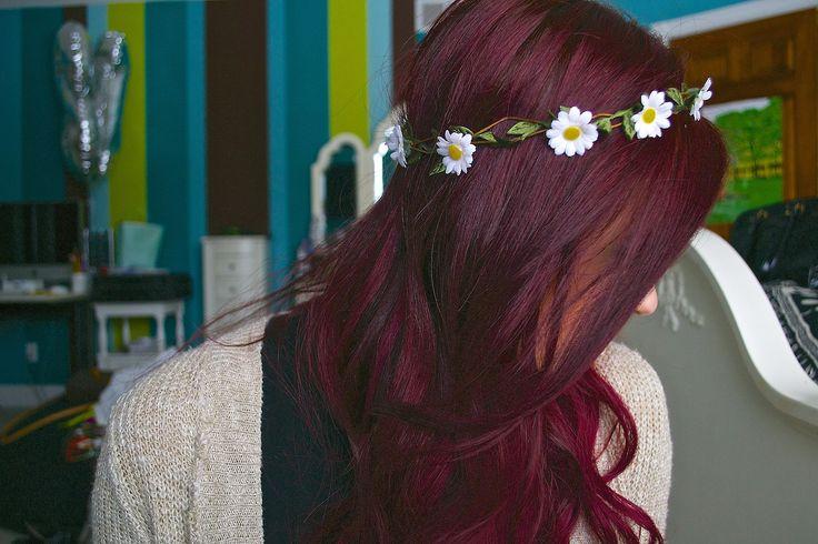 red curly hair with a flower crown
