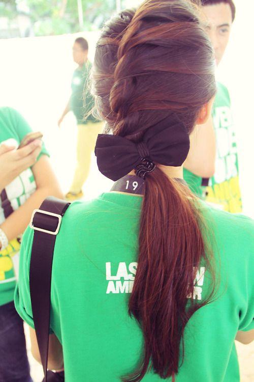 Long brown hair with bow