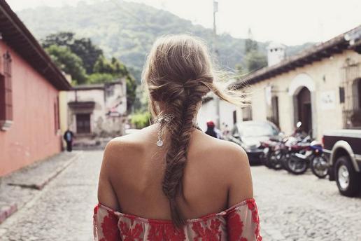 low and loose fishtail braid
