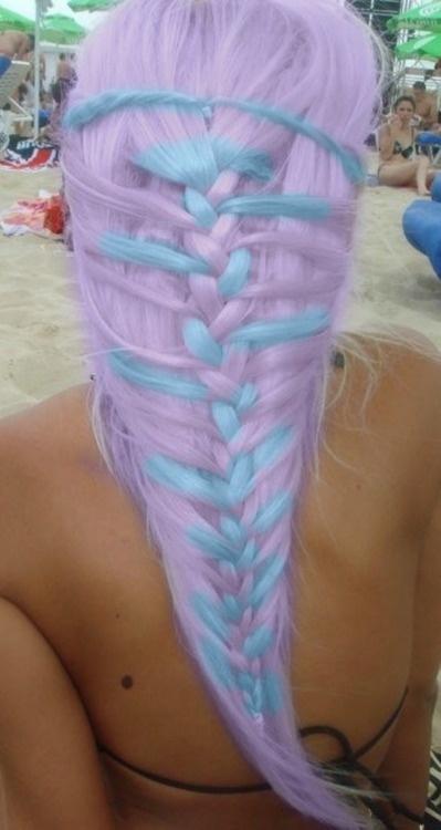 Lavender and baby blue hair in plaited braid. Mermaid hair. Pastel hair color. Creative hair style.